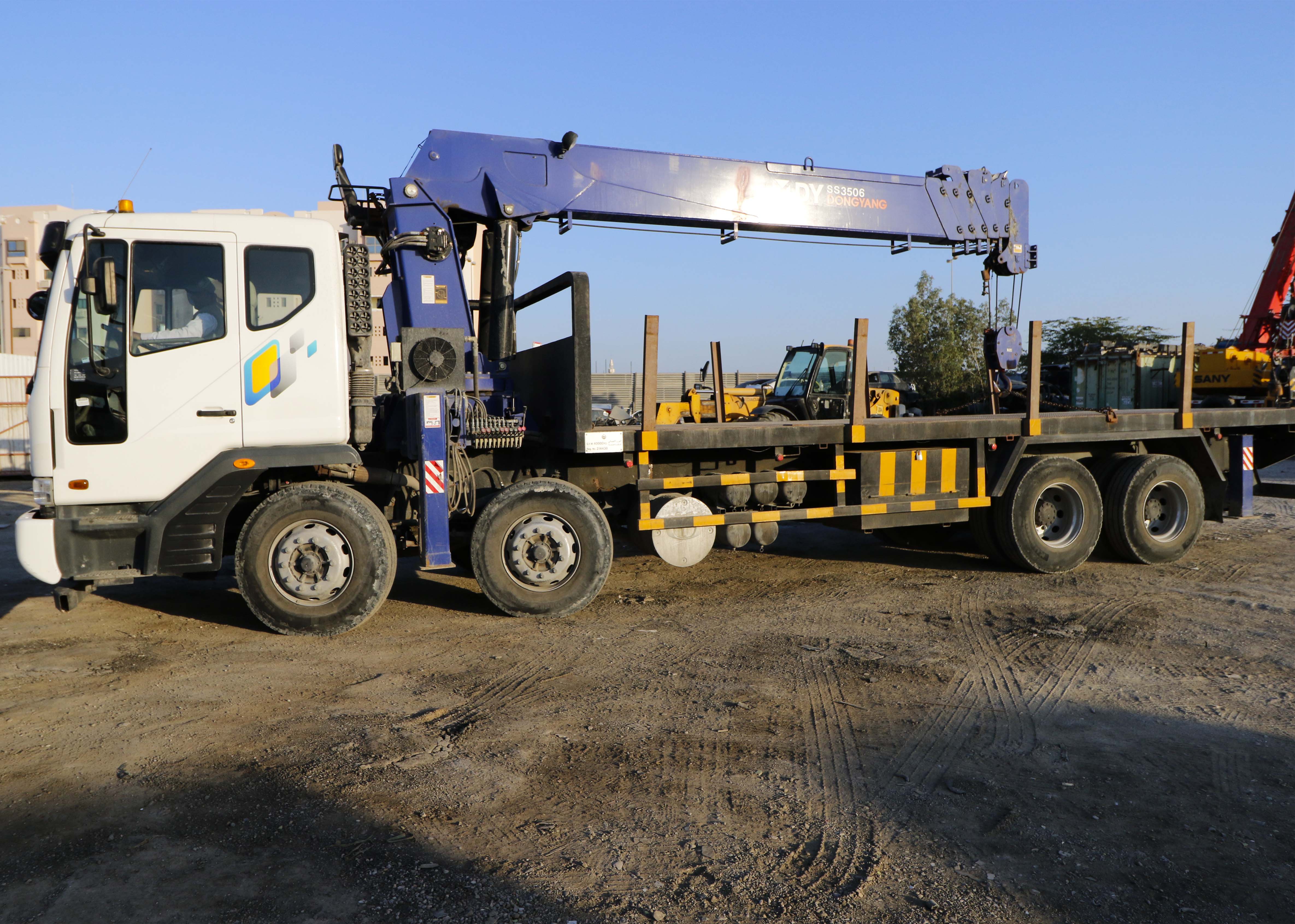 Hire DONGYANG Hiab with DAEWOO Navus Trailer Online | Machinery for Rent | Qetaat.com